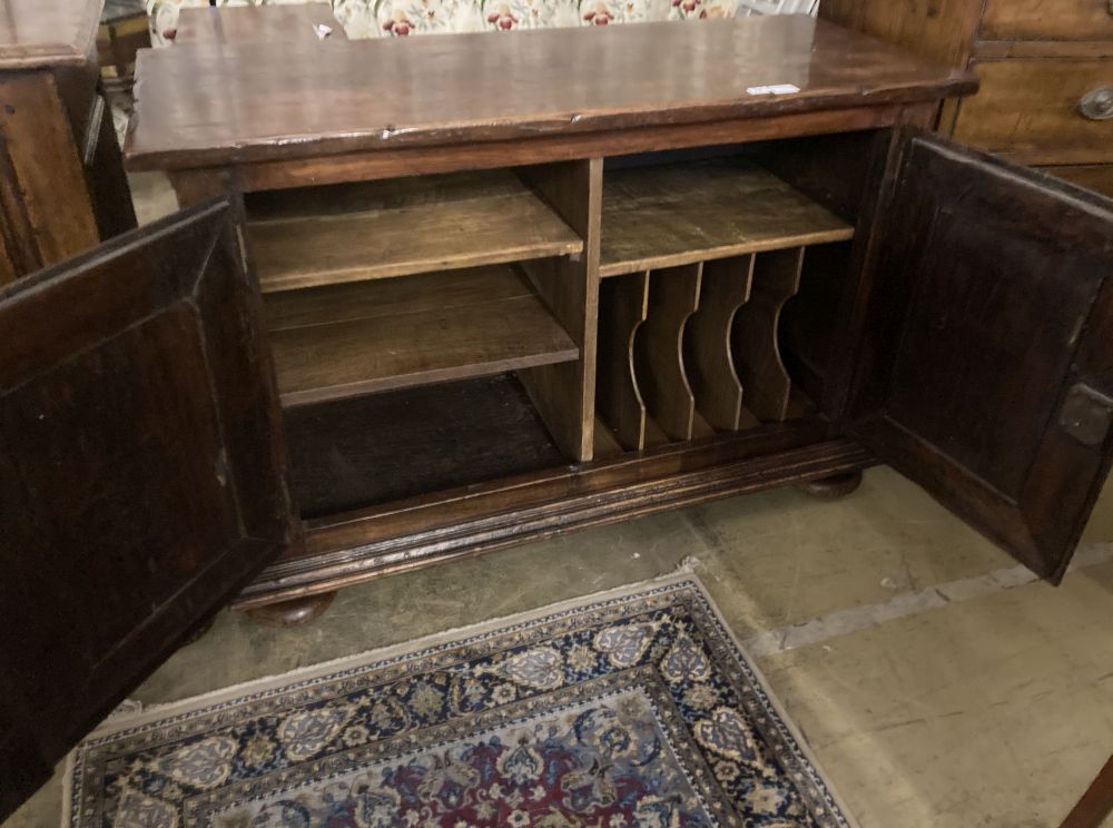 A mid 18th century French provincial oak and elm two door cupboard, with fruitwood top, width 129cm, depth 54cm, height 87cm